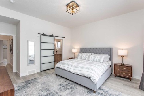 2 Twin Rose Court, Jarvis Bay, AB - Indoor Photo Showing Bedroom
