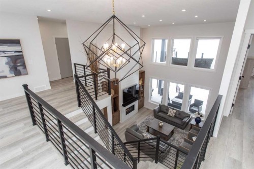 2 Twin Rose Court, Jarvis Bay, AB - Indoor Photo Showing Other Room With Fireplace