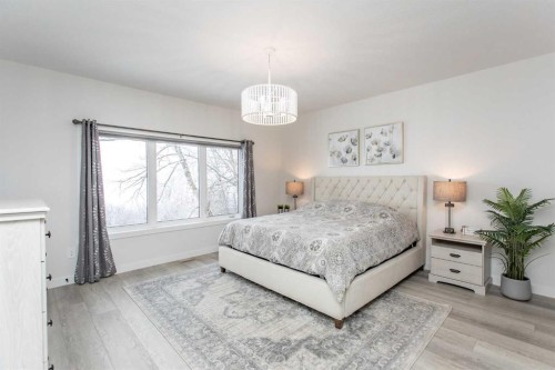 2 Twin Rose Court, Jarvis Bay, AB - Indoor Photo Showing Bedroom