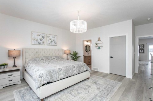 2 Twin Rose Court, Jarvis Bay, AB - Indoor Photo Showing Bedroom