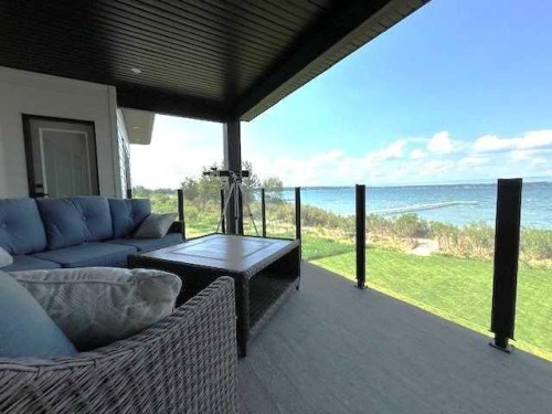 2 Twin Rose Court, Jarvis Bay, AB - Outdoor With Body Of Water With Exterior