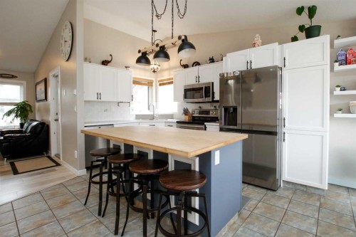 107 Ackerman Crescent, Red Deer, AB - Indoor Photo Showing Kitchen With Stainless Steel Kitchen
