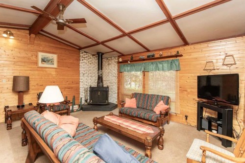 224-41124 Range Road 282 Range, Gull Lake, AB - Indoor Photo Showing Living Room With Fireplace
