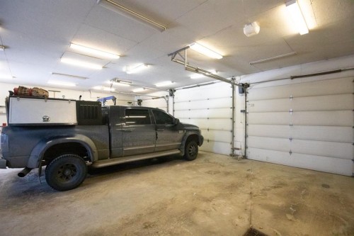 23 Jepsen Crescent, Red Deer, AB - Indoor Photo Showing Garage
