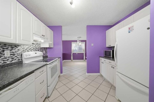 106 Denovan Crescent, Red Deer, AB - Indoor Photo Showing Kitchen