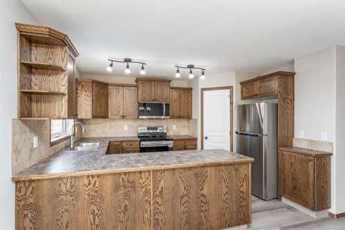 92 Iron Wolf Boulevard, Lacombe, AB - Indoor Photo Showing Kitchen