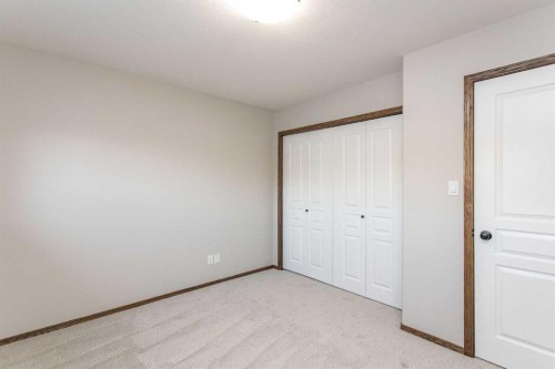 92 Iron Wolf Boulevard, Lacombe, AB - Indoor Photo Showing Other Room