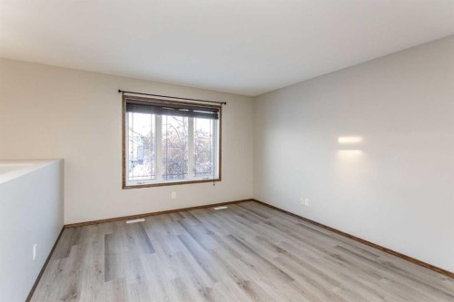 92 Iron Wolf Boulevard, Lacombe, AB - Indoor Photo Showing Other Room