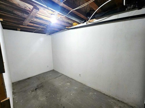 5103 49 Avenue, Caroline, AB - Indoor Photo Showing Basement