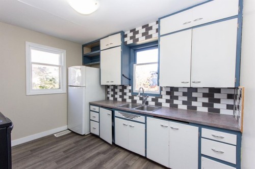 4206 51A Street, Red Deer, AB - Indoor Photo Showing Kitchen With Double Sink