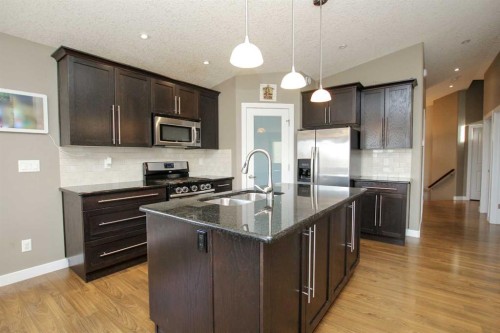 5825 Panorama Drive, Blackfalds, AB - Indoor Photo Showing Kitchen With Double Sink With Upgraded Kitchen