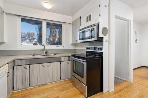 11 Montrose, Camrose, AB - Indoor Photo Showing Kitchen With Double Sink