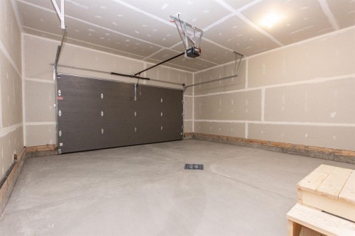 50 Turnbull Close, Red Deer, AB - Indoor Photo Showing Garage