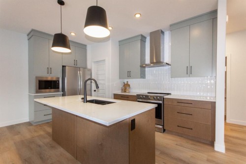 50 Turnbull Close, Red Deer, AB - Indoor Photo Showing Kitchen With Double Sink With Upgraded Kitchen