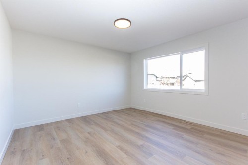 256 Augustus Way, Penhold, AB - Indoor Photo Showing Other Room