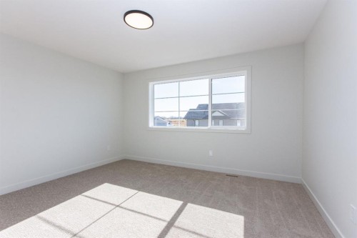 256 Augustus Way, Penhold, AB - Indoor Photo Showing Other Room