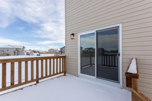 256 Augustus Way, Penhold, AB - Outdoor With Deck Patio Veranda With Exterior