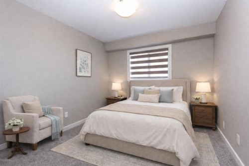 202-148 Vanier Drive, Red Deer, AB - Indoor Photo Showing Bedroom