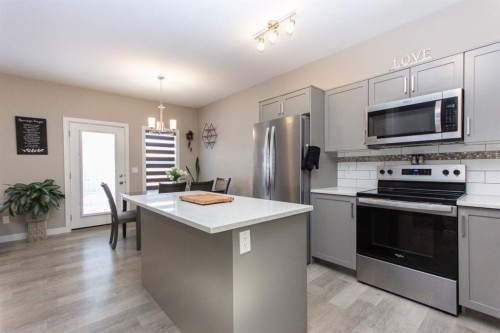 202-148 Vanier Drive, Red Deer, AB - Indoor Photo Showing Kitchen With Stainless Steel Kitchen