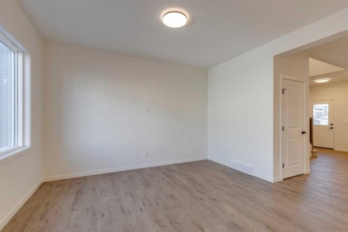 1419 Bayview Crescent Sw, Airdrie, AB - Indoor Photo Showing Other Room