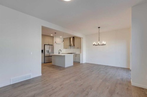 1419 Bayview Crescent Sw, Airdrie, AB - Indoor Photo Showing Kitchen