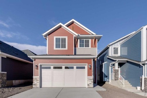 1419 Bayview Crescent Sw, Airdrie, AB - Outdoor With Facade