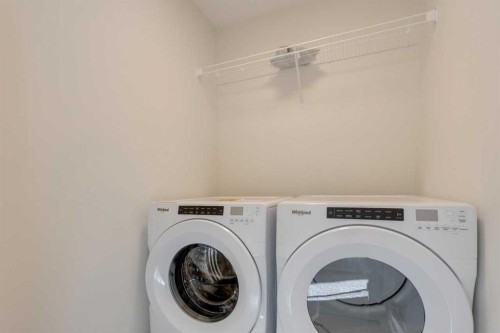 1419 Bayview Crescent Sw, Airdrie, AB - Indoor Photo Showing Laundry Room