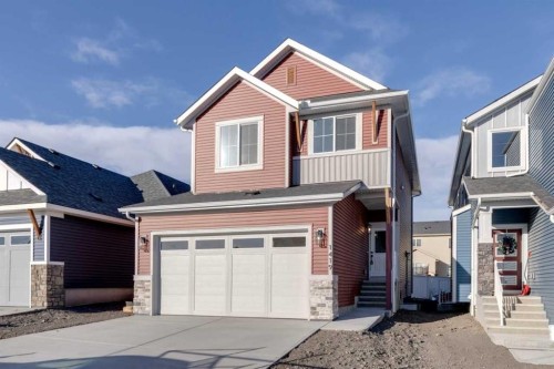 1419 Bayview Crescent Sw, Airdrie, AB - Outdoor With Facade