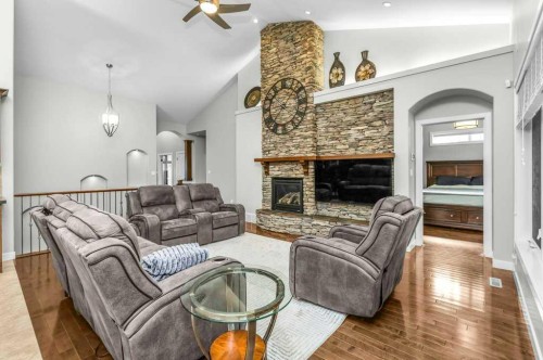 34 Overand Place, Red Deer, AB - Indoor Photo Showing Living Room With Fireplace