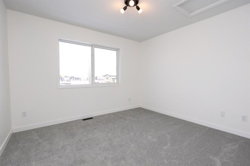 65 Leung Place, Blackfalds, AB - Indoor Photo Showing Other Room