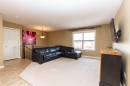 114 Redwood Boulevard, Springbrook, AB  - Indoor Photo Showing Living Room 