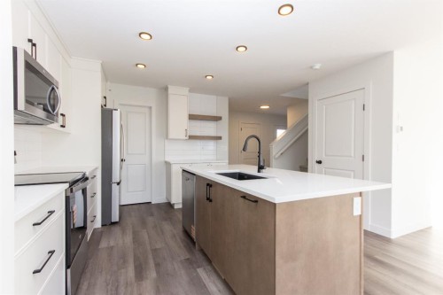 17 Trinity Street, Lacombe, AB - Indoor Photo Showing Kitchen With Upgraded Kitchen
