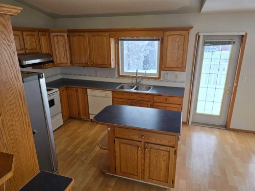 30 Logan Close, Red Deer, AB - Indoor Photo Showing Kitchen With Double Sink