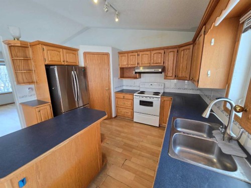 30 Logan Close, Red Deer, AB - Indoor Photo Showing Kitchen With Double Sink