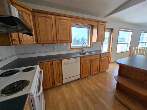 30 Logan Close, Red Deer, AB - Indoor Photo Showing Kitchen With Double Sink