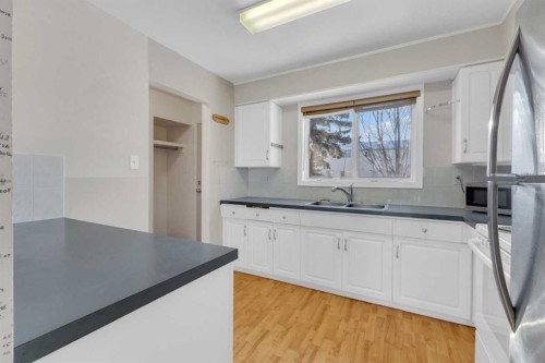 209-5831 57 Street, Red Deer, AB - Indoor Photo Showing Kitchen With Double Sink