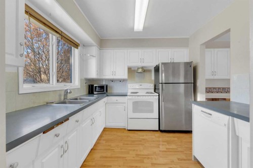 209-5831 57 Street, Red Deer, AB - Indoor Photo Showing Kitchen With Double Sink