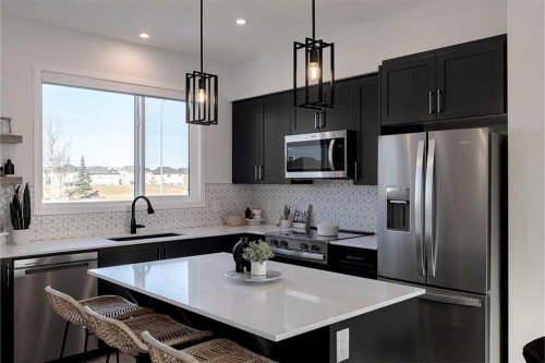 103-1350 Cornerstone Street Ne, Calgary, AB - Indoor Photo Showing Kitchen With Upgraded Kitchen