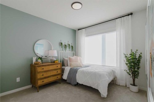 103-1350 Cornerstone Street Ne, Calgary, AB - Indoor Photo Showing Bedroom