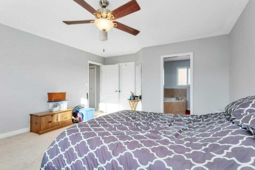132 Sabre Road, Springbrook, AB - Indoor Photo Showing Bedroom