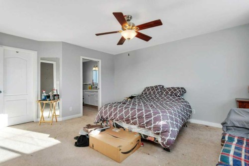 132 Sabre Road, Springbrook, AB - Indoor Photo Showing Bedroom
