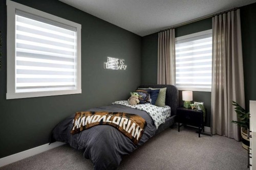 566 Wolf Willow Boulevard Se, Calgary, AB - Indoor Photo Showing Bedroom