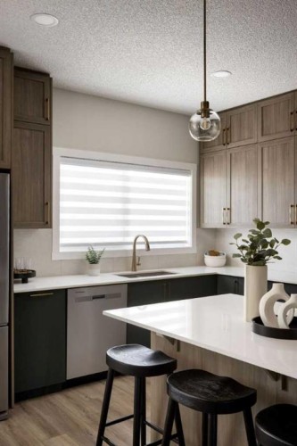 566 Wolf Willow Boulevard Se, Calgary, AB - Indoor Photo Showing Kitchen With Upgraded Kitchen