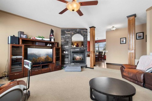2120 18 Avenue, Delburne, AB - Indoor Photo Showing Living Room With Fireplace