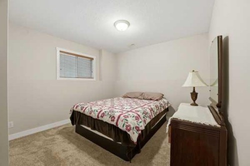 72 Dempsey Street, Red Deer, AB - Indoor Photo Showing Bedroom