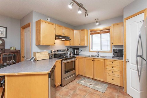 24 Dynes Street, Red Deer, AB - Indoor Photo Showing Kitchen With Double Sink