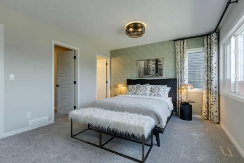 174 Mitchell Road Nw, Calgary, AB - Indoor Photo Showing Bedroom