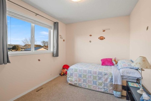 10 Timmons Close, Lacombe, AB - Indoor Photo Showing Bedroom