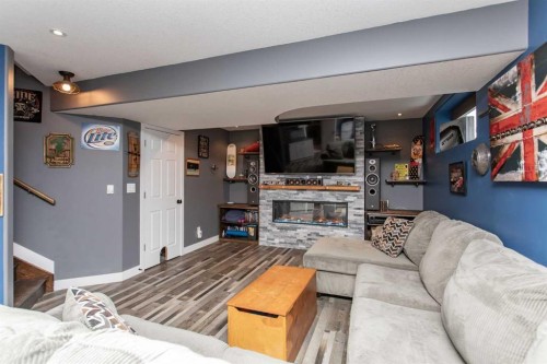 156 Long Close, Red Deer, AB - Indoor Photo Showing Living Room With Fireplace