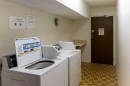 #101-406-4744 54 Street, Red Deer, AB  - Indoor Photo Showing Laundry Room 